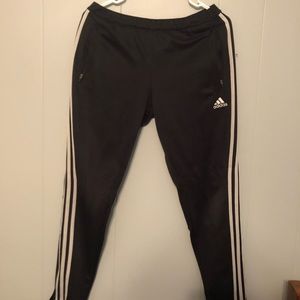 Adidas track pants.